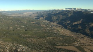 HD stock footage aerial video of rural homes at sunrise at the base of mountains, Buena Vista, Colorado Aerial Stock Footage | HDA13_452