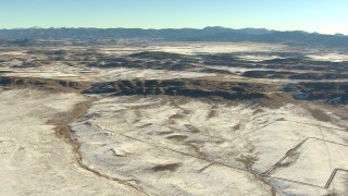 HD stock footage aerial video of approaching hills with light snow in Park County, Colorado Aerial Stock Footage | HDA13_465