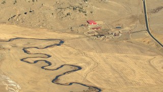 HD stock footage aerial video of a farm and a winding river in Park County, Colorado Aerial Stock Footage | HDA13_472