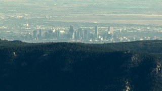 HD stock footage aerial video of the Denver skyline seen from the Rocky Mountains, Colorado Aerial Stock Footage | HDA13_477