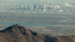 HD stock footage aerial video of Downtown Denver and Marston Lake seen from the Rocky Mountains, Colorado Aerial Stock Footage | HDA13_482_02