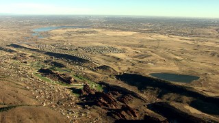 HD stock footage aerial video of Roxborough Park and reservoirs, zoom tighter on Downtown Denver skyline, Colorado Aerial Stock Footage | HDA13_483_01