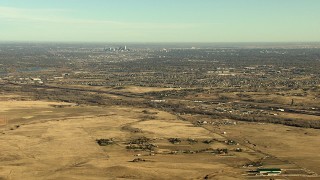 HD stock footage aerial video of the Downtown Denver skyline and surrounding suburbs in Colorado Aerial Stock Footage | HDA13_484