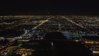 5K aerial stock footage tilt from runway to reveal approaching jet at night, LAX (Los Angeles International Airport), California Aerial Stock Footage | LD01_0008