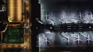 5K aerial stock footage a bird's eye of LAX (Los Angeles International Airport), California at night Aerial Stock Footage | LD01_0014