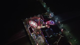 5K aerial stock footage bird's eye view of the Ferris wheel at night, Santa Monica Pier, California Aerial Stock Footage | LD01_0037