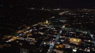 LD01_0060 - 5K aerial stock footage flying toward the Beverly Hills Police Department at night, California