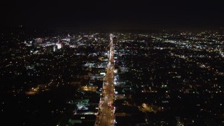 LD01_0068 - 5K aerial stock footage tilt from bird's eye of Sunset Strip in West Hollywood, California at night