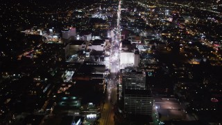 LD01_0070 - 5K aerial stock footage approach hotels and theaters at night in Hollywood, California