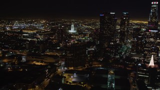 5K aerial stock footage of city hall, and reveal skyscrapers at night in Downtown Los Angeles, California Aerial Stock Footage | LD01_0075