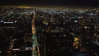 5K aerial stock footage flying over skyscrapers at night in Downtown Los Angeles, California Aerial Stock Footage | LD01_0077