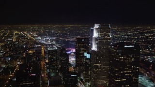 5K aerial stock footage of panning across skyscrapers in night inDowntown Los Angeles, California Aerial Stock Footage | LD01_0079