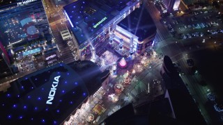 LD01_0082 - 5K aerial stock footage orbit ice skating at Nokia Theater, and tilt to hotels at night Downtown Los Angeles, California