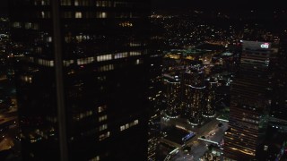 5K aerial stock footage flyby skyscrapers to reveal city hall at night Downtown Los Angeles, California Aerial Stock Footage | LD01_0085