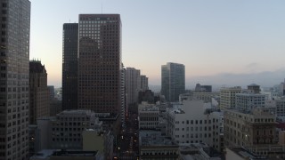 5.7K stock footage aerial video ascend for view of skyscrapers at sunrise in Downtown San Francisco, California Aerial Stock Footage | PP0002_000048