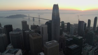 5.7K stock footage aerial video slowly passing Salesforce Tower and skyscrapers at sunrise in Downtown San Francisco, California Aerial Stock Footage | PP0002_000054