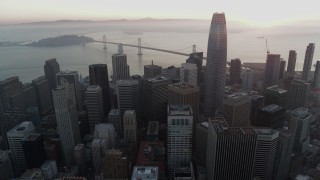 5.7K stock footage aerial video of Salesforce Tower at sunrise near Bay Bridge in Downtown San Francisco, California Aerial Stock Footage | PP0002_000061