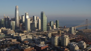 5.7K stock footage aerial video pan from the city skyline to reveal the Bay Bridge, Downtown San Francisco, California Aerial Stock Footage | PP0002_000086