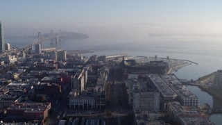 5.7K stock footage aerial video pan from AT&T Park to reveal I-80 freeway and Bay Bridge near skyline, Downtown San Francisco, California Aerial Stock Footage | PP0002_000105