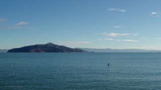 5.7K stock footage aerial video pan across the bay to focus on Angel Island, San Francisco Bay, California Aerial Stock Footage | PP0002_000113