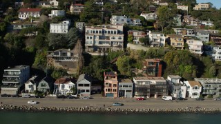 5.7K stock footage aerial video slowly pass waterfront homes on a hill by Richardson Bay in Sausalito, California Aerial Stock Footage | PP0002_000125