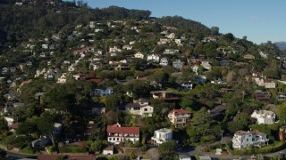 PP0002_000127 - 5.7K stock footage aerial video ascend past homes on a hill for a view of neighborhoods at the top in Sausalito, California