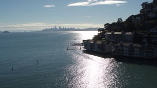 5.7K stock footage aerial video a view of the San Francisco skyline during decent, pan to condos in Sausalito, California Aerial Stock Footage | PP0002_000133