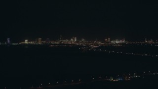 PP003_001 - HD stock footage aerial video of approach hotels and casinos of the skyline of Atlantic City, New Jersey at night