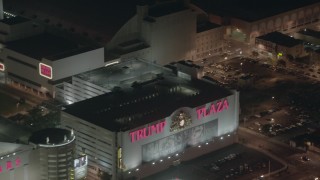 PP003_015 - HD stock footage aerial video pan from famous hotels and casinos to reveal another at night, Atlantic City, New Jersey