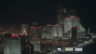 PP003_018 - HD stock footage aerial video of waterfront hotels and casinos at night, Atlantic City, New Jersey