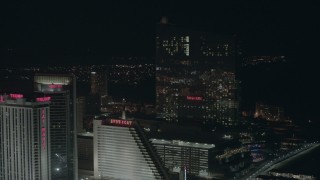 PP003_024 - HD stock footage aerial video flyby three hotels and casinos at night in Atlantic City, New Jersey