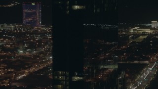 PP003_025 - HD stock footage aerial video of a closeup orbit of the Revel hotel and casino at night in Atlantic City, New Jersey