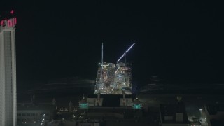 PP003_035 - HD aerial stock footage video of flying by rides on Steel Pier at night, Atlantic City, New Jersey