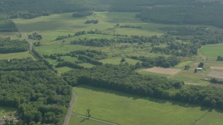 HD stock footage aerial video of flying over farms and green fields, Jackson, New Jersey Aerial Stock Footage | PP003_059