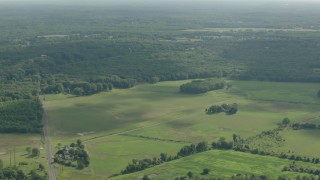 HD stock footage aerial video of a rural landscape of farm fields in Jackson, New Jersey Aerial Stock Footage | PP003_060