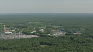 HD stock footage aerial video of flying by rides and roller coaster at Six Flags Great Adventure theme park, Jackson, New Jersey Aerial Stock Footage | PP003_066