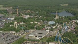 HD stock footage aerial video pass rides and a roller coaster at Six Flags Great Adventure theme park in Jackson, New Jersey Aerial Stock Footage | PP003_068