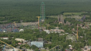 HD stock footage aerial video of several rides and roller coasters at the Six Flags Great Adventure theme park in Jackson, New Jersey Aerial Stock Footage | PP003_069