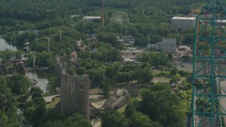 HD stock footage aerial video of panning past roller coasters at Six Flags Great Adventure theme park in Jackson, New Jersey Aerial Stock Footage | PP003_072