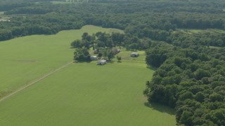 HD stock footage aerial video of barns at the end of farm fields in Jackson, New Jersey Aerial Stock Footage | PP003_078