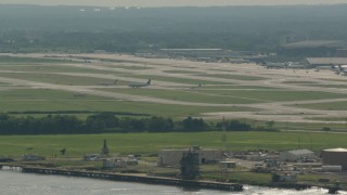 HD stock footage aerial video of commercial planes at Philadelphia International Airport, Pennsylvania Aerial Stock Footage | PP003_096