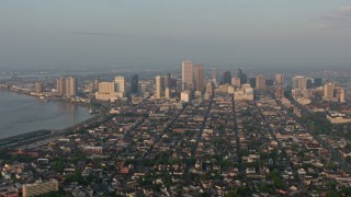 4K aerial stock footage of fly over French Quarter to approach Downtown at sunrise, New Orleans, Louisiana Aerial Stock Footage | PVED01_005