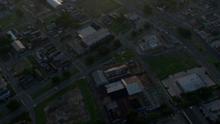 4K aerial stock footage fly over Downtown New Orleans toward the Mississippi River at sunrise, Louisiana Aerial Stock Footage | PVED01_009E