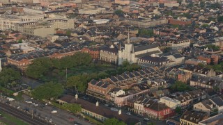 4K aerial stock footage orbit St. Louis Cathedral and Jackson Square at sunrise, New Orleans, Louisiana Aerial Stock Footage | PVED01_032