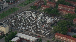 PVED01_053 - 4K aerial stock footage orbit of St. Louis Cemetery in French Quarter, New Orleans, Louisiana at sunrise