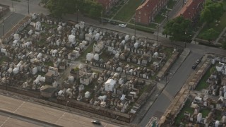 4K aerial stock footage of two cemeteries in the French Quarter of New Orleans at sunrise, Louisiana Aerial Stock Footage | PVED01_054