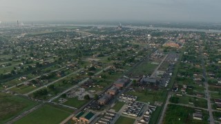 4K aerial stock footage orbit urban residential neighborhoods in the Lower Ninth Ward of New Orleans at sunrise, Louisiana Aerial Stock Footage | PVED01_062