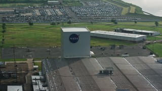 4K aerial stock footage orbit factory with NASA Logo at sunrise in New Orleans East, Louisiana Aerial Stock Footage | PVED01_080