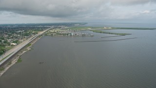 4K aerial stock footage wide orbit of a marina on Lake Pontchartrain at sunrise in Louisiana Aerial Stock Footage | PVED01_090