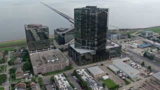 4K aerial stock footage orbit Lakefront Hotel and office buildings in Metairie, New Orleans, Louisiana Aerial Stock Footage | PVED01_101